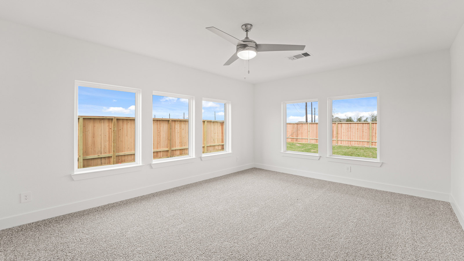 entertainment room with bright windows