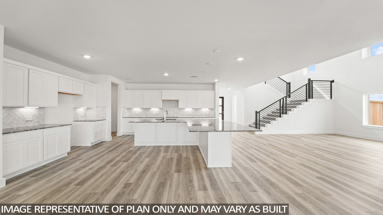 Open concept living, dining, and kitchen area