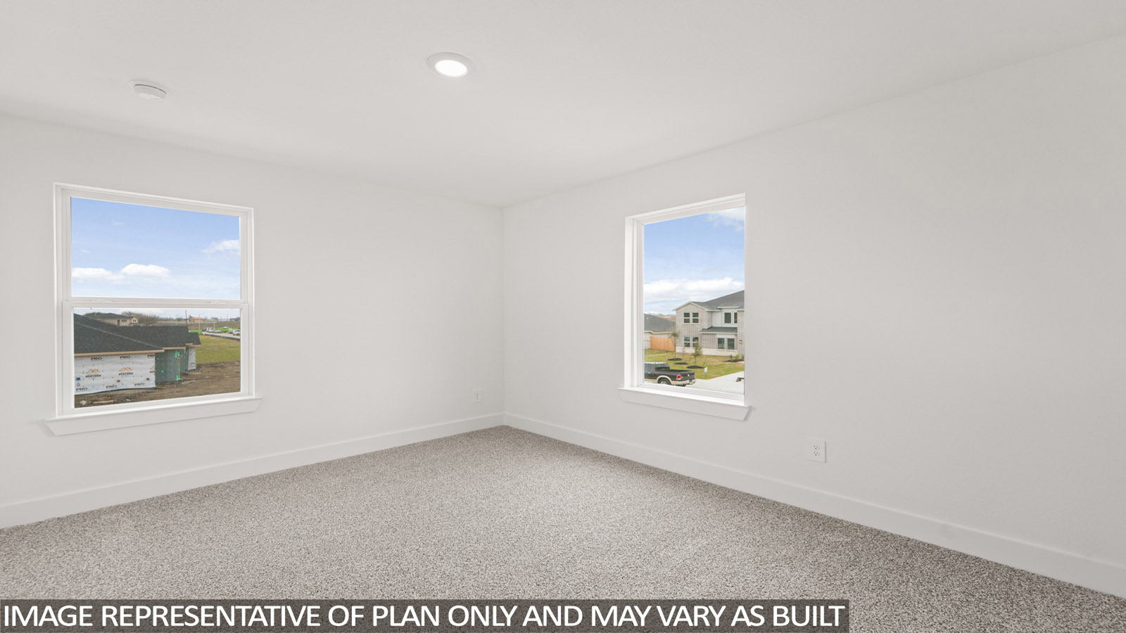 Second story game room with carpet flooring