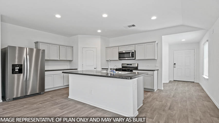 Open concept living, dining, and kitchen area