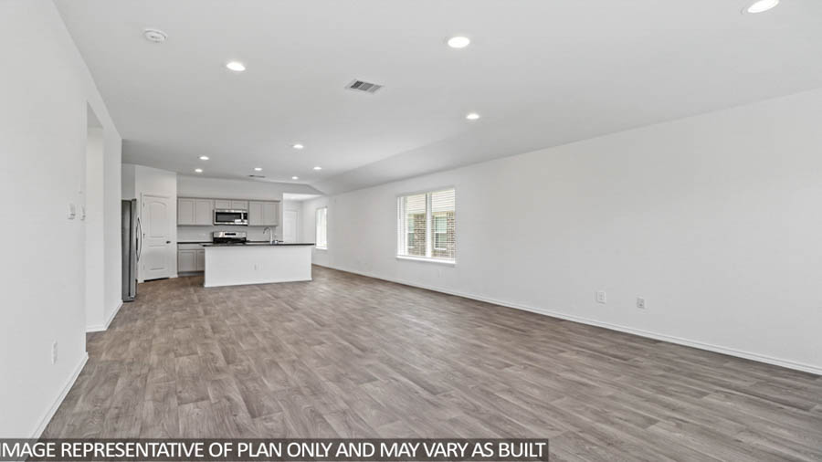 Open concept living, dining, and kitchen area
