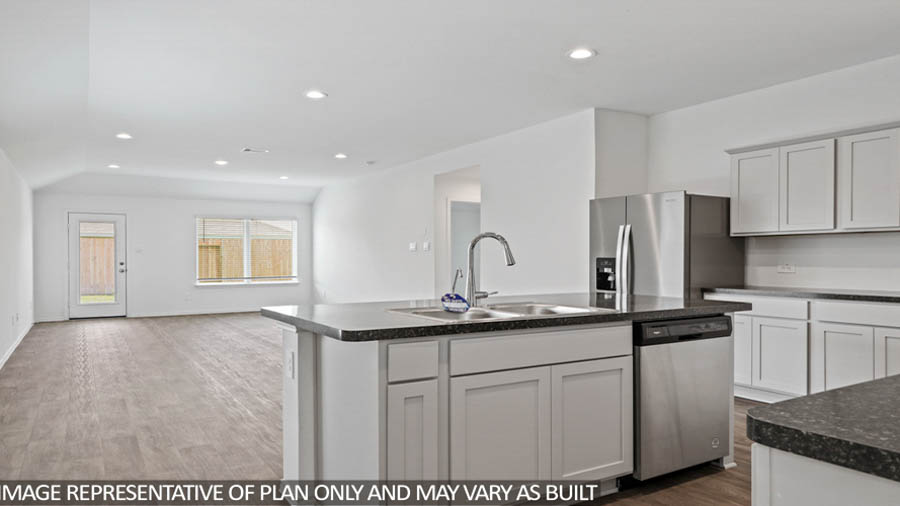 Open concept living, dining, and kitchen area