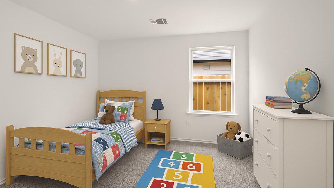 Secondary bedroom with carpet flooring