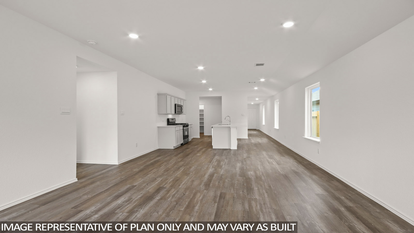 Open concept living, dining, and kitchen area