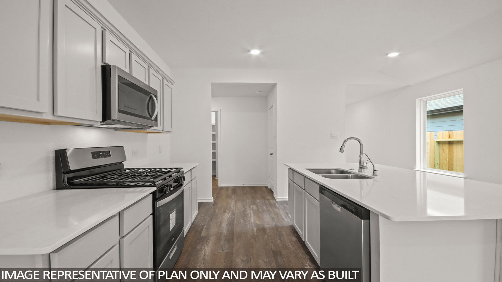 Open concept living, dining, and kitchen area