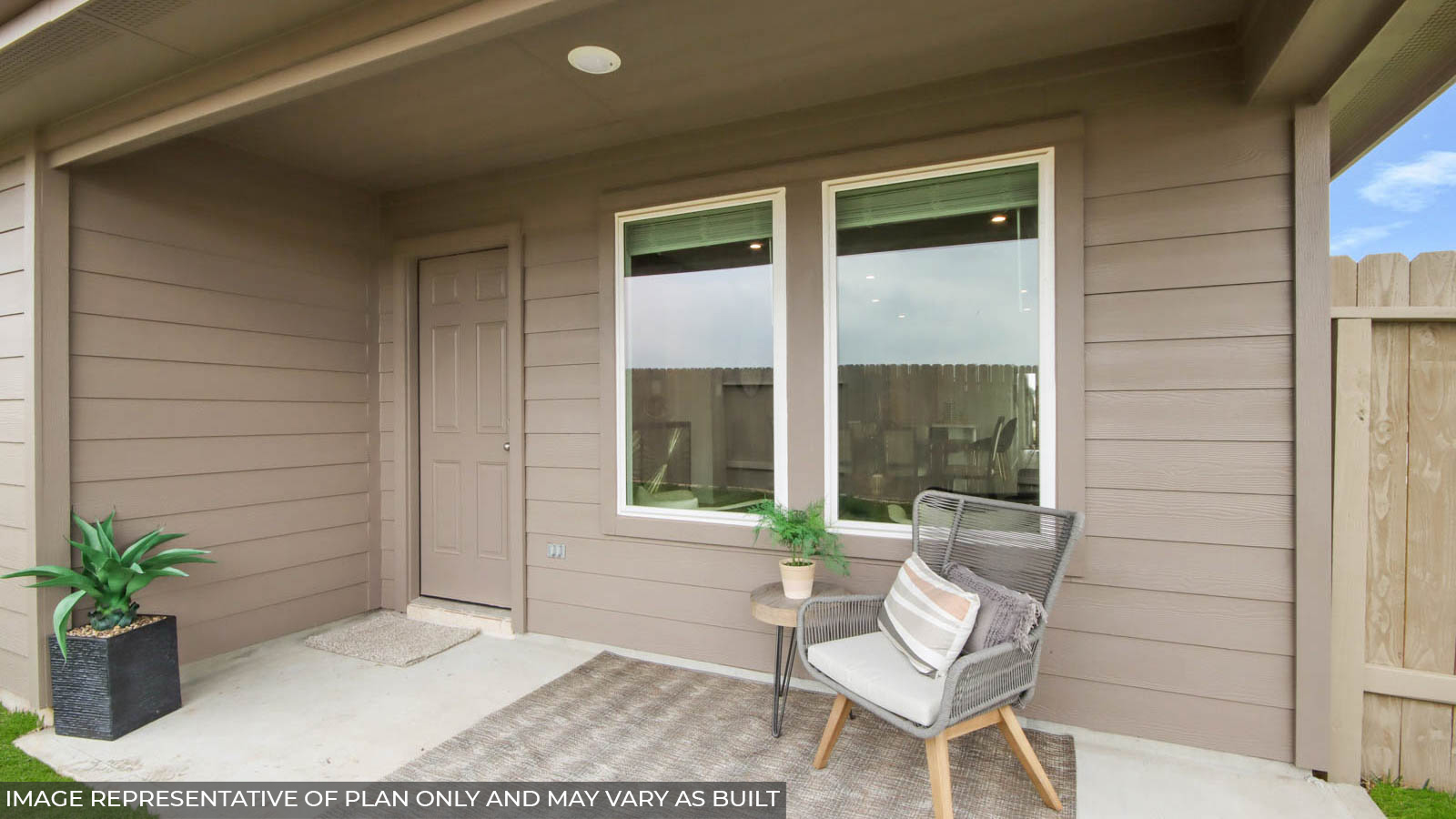 covered back patio with overhead lighting