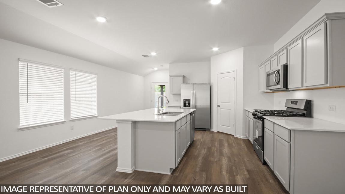 Open concept living, dining, and kitchen area