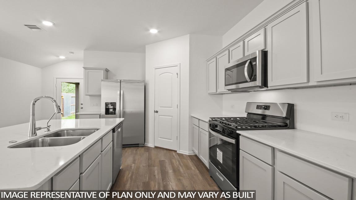 Open concept living, dining, and kitchen area