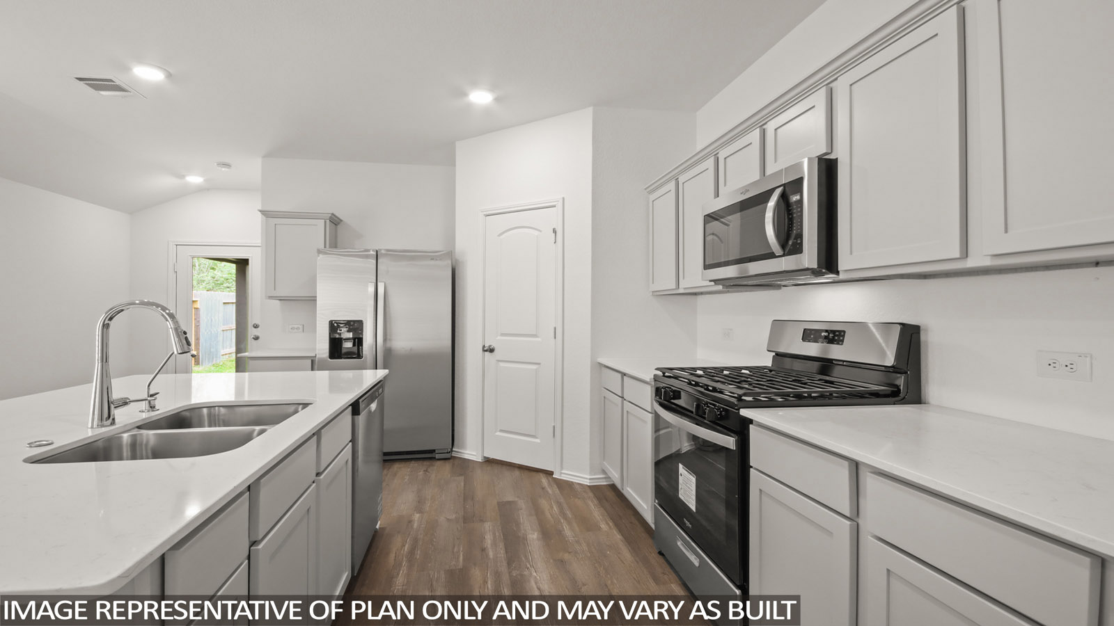 Open concept living, dining, and kitchen area