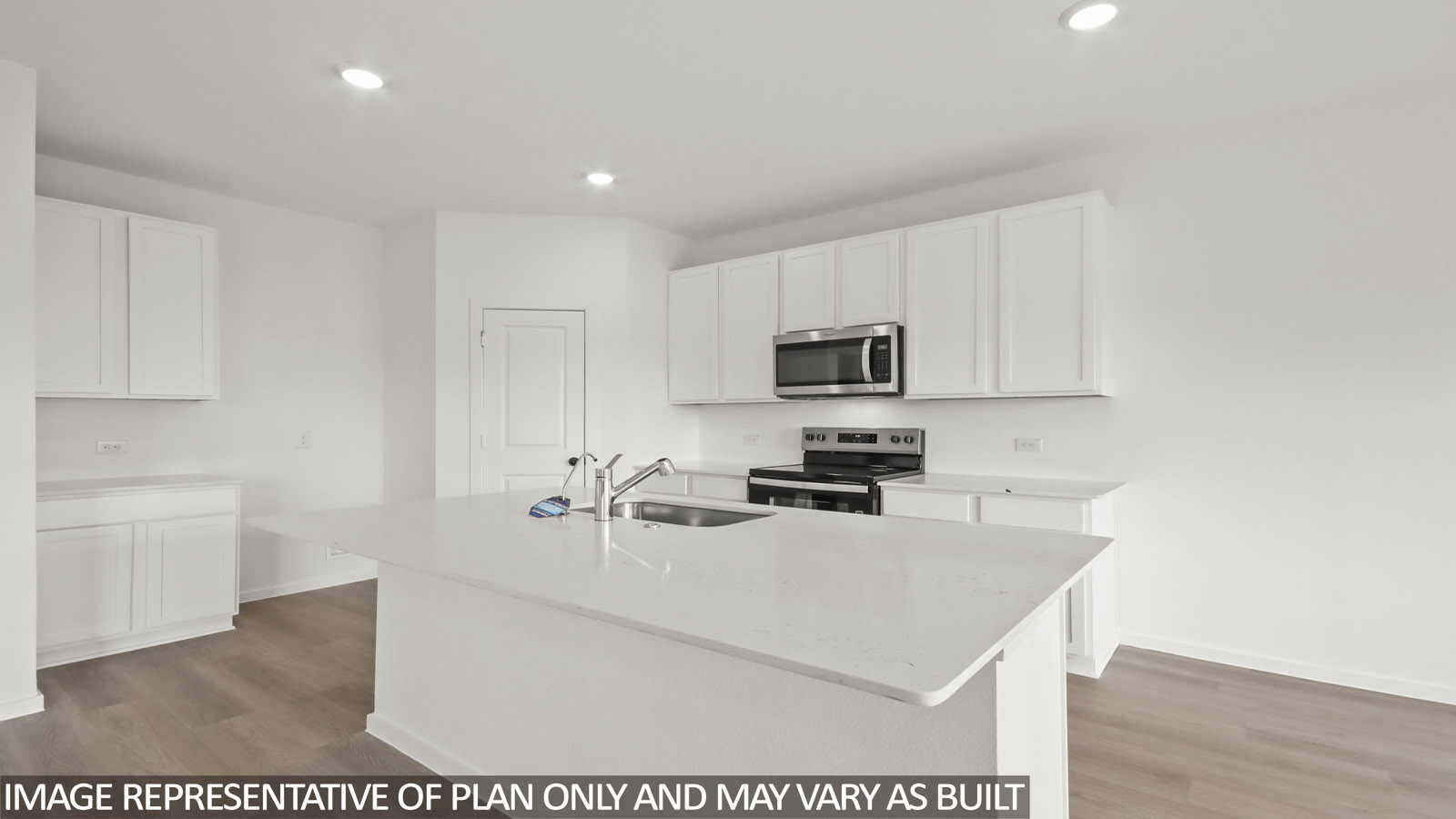 Open concept living, dining, and kitchen area