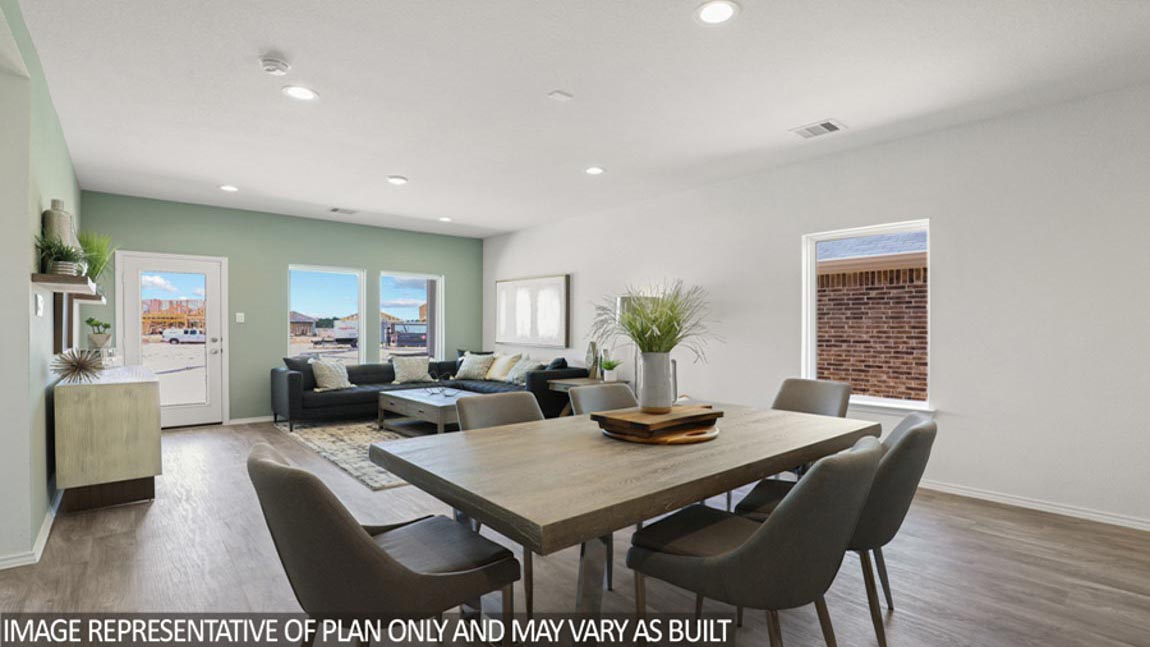 Open concept living, dining, and kitchen area