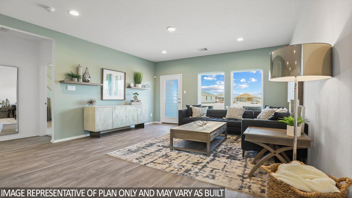 Open concept living, dining, and kitchen area