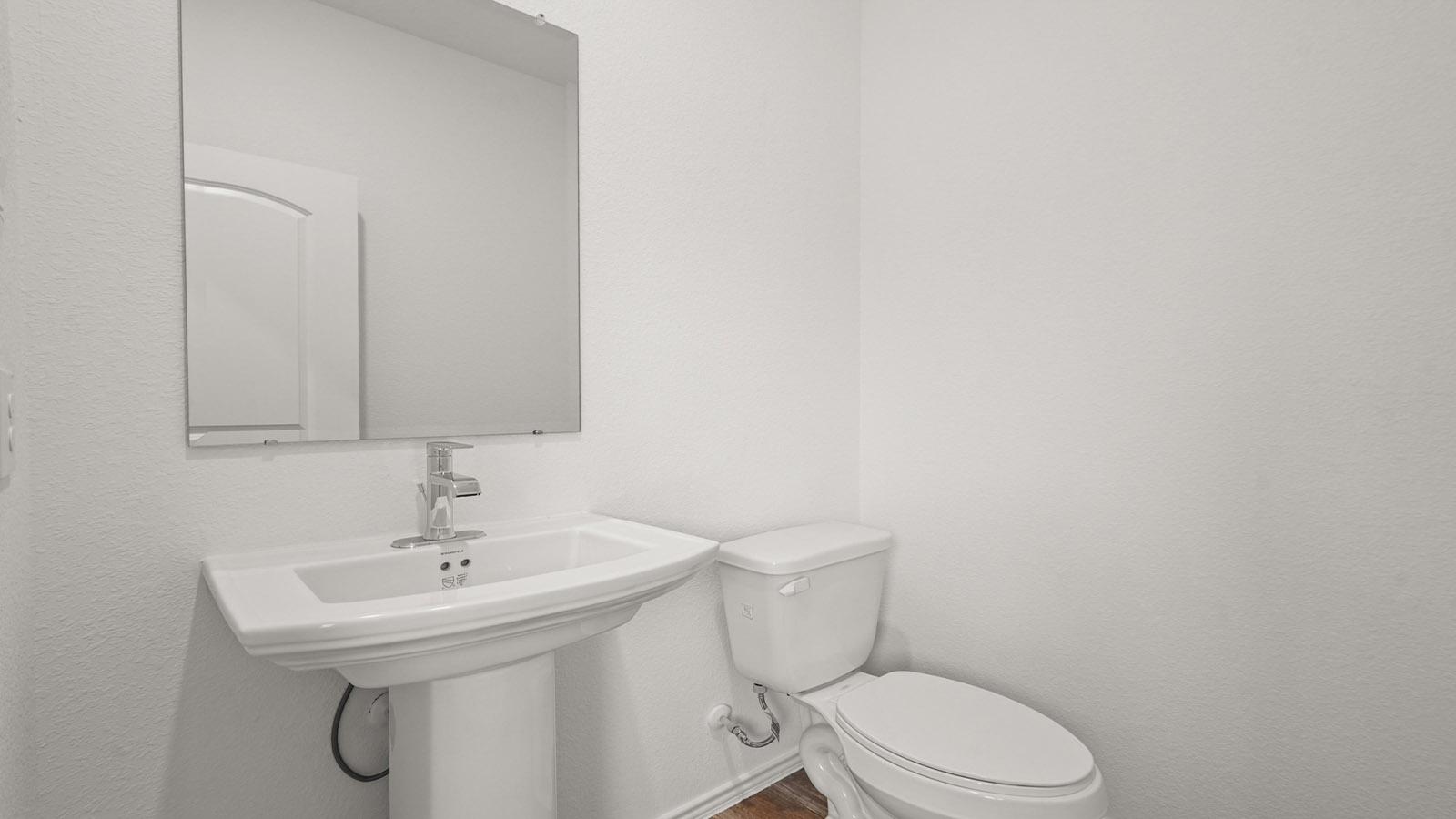 Powder bathroom with pedestal sink