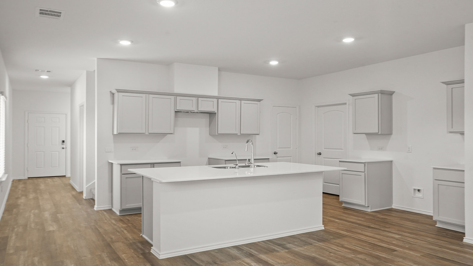 Open concept living, dining, and kitchen area