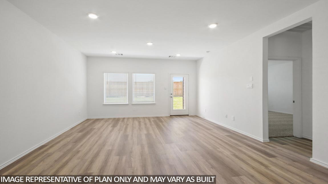 Open concept living, dining, and kitchen area