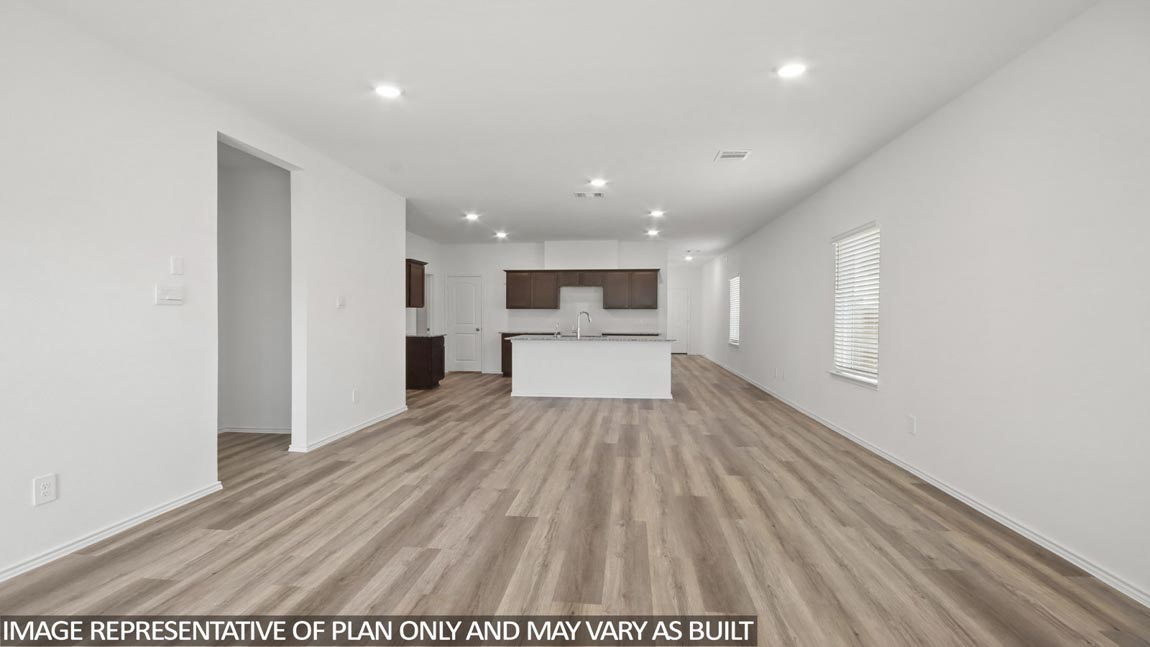 Open concept living, dining, and kitchen area