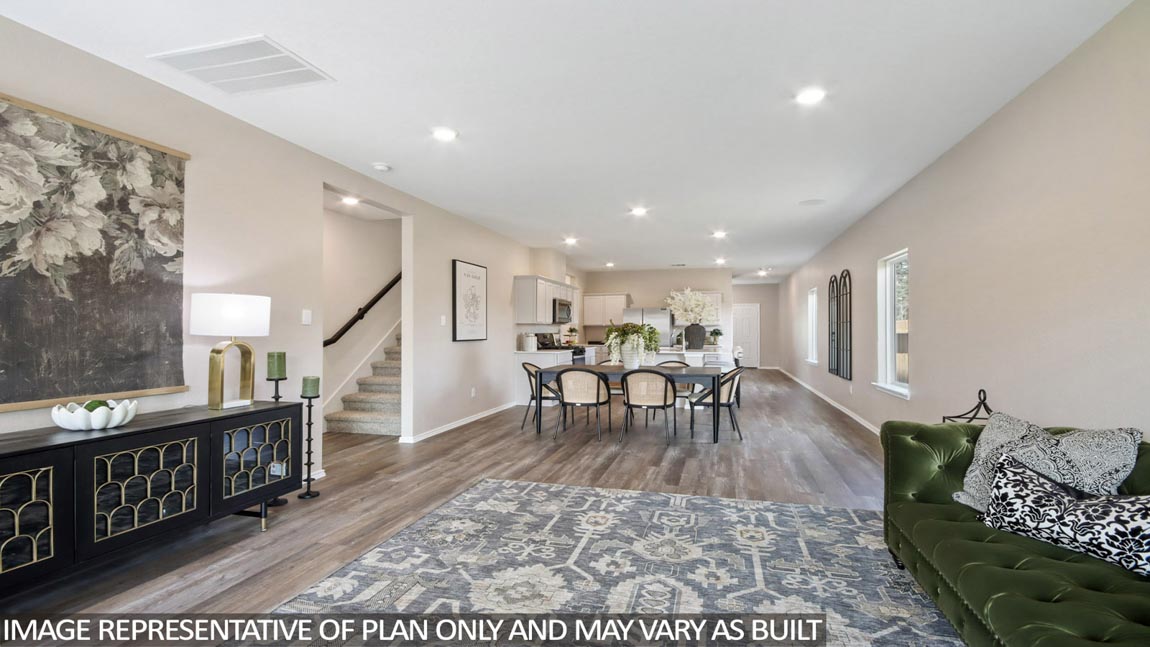 Open concept living, dining, and kitchen area