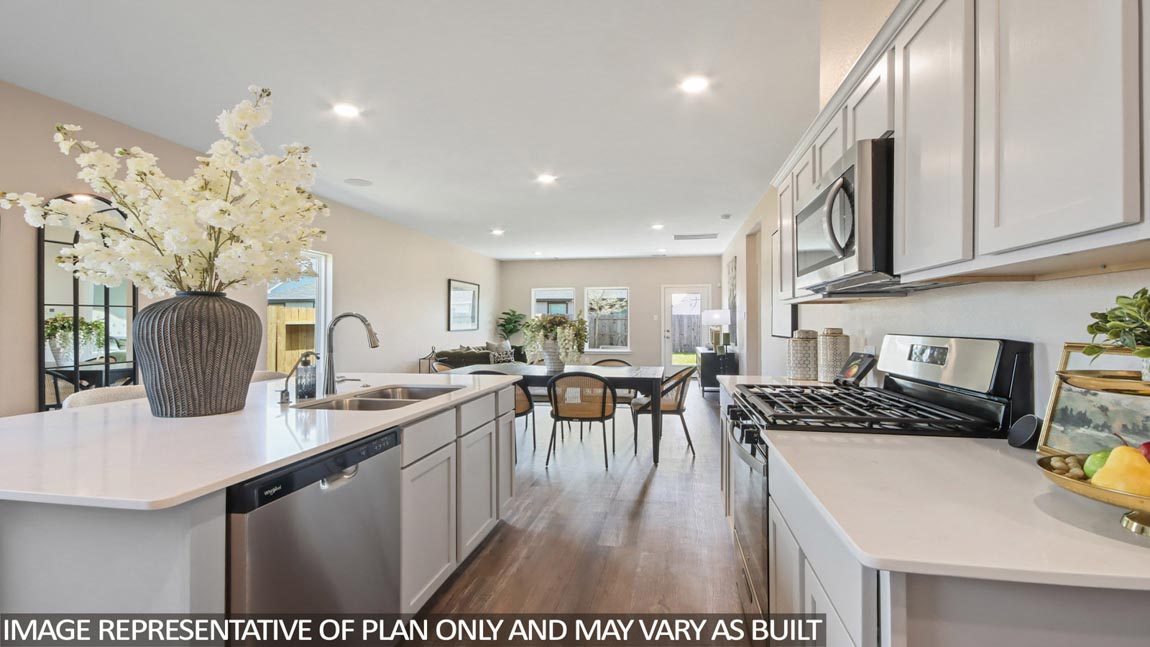 Open concept living, dining, and kitchen area