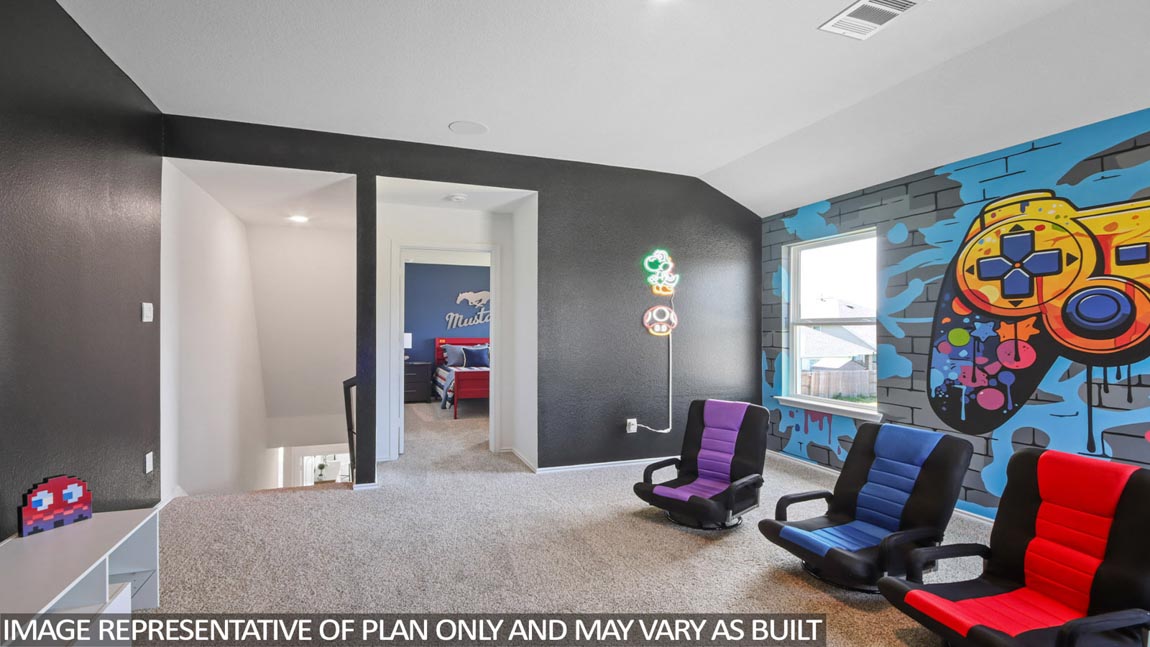 Second story game room with carpet flooring