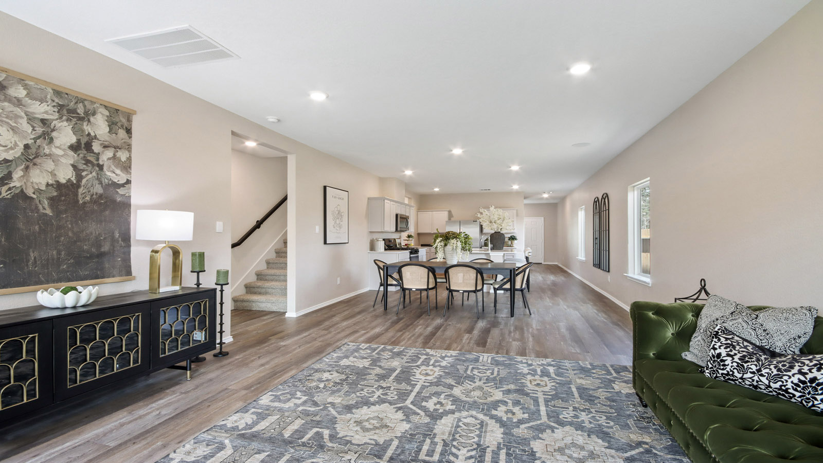 Open concept living, dining, and kitchen area