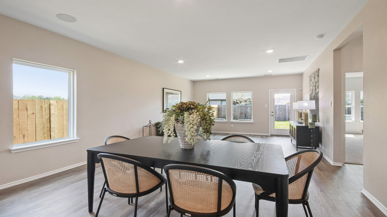 Open concept living, dining, and kitchen area