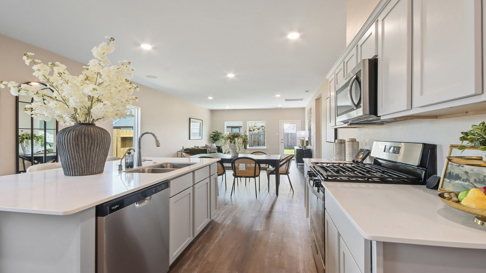 Open concept living, dining, and kitchen area
