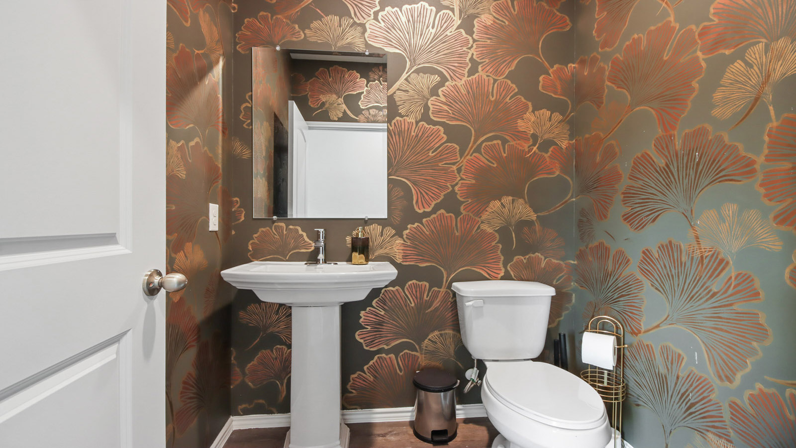 Powder bathroom with pedestal sink
