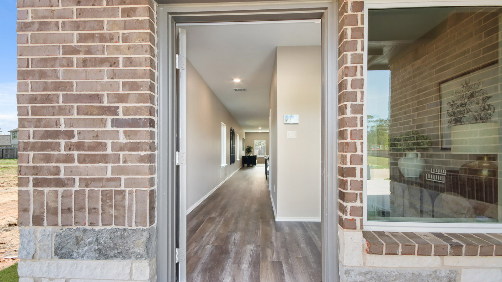 Entry hallway with vinyl flooring