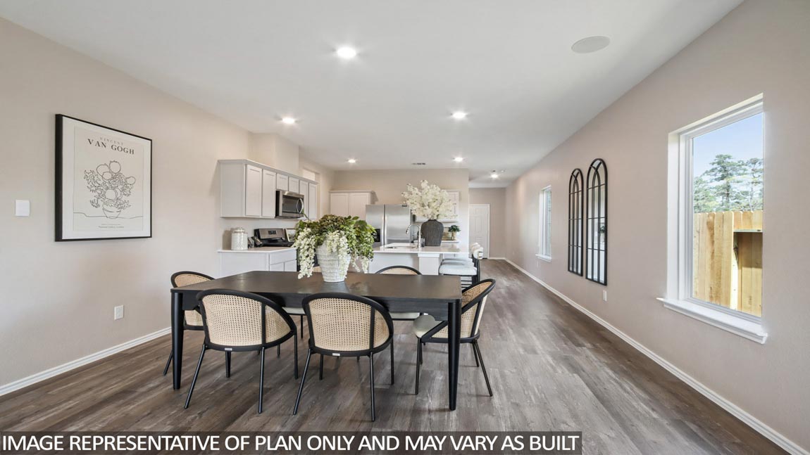 Open concept living, dining, and kitchen area