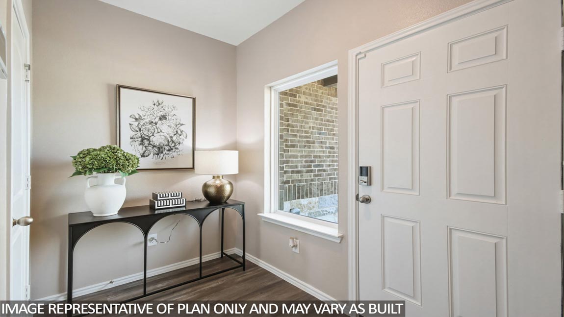Entry hallway with vinyl flooring