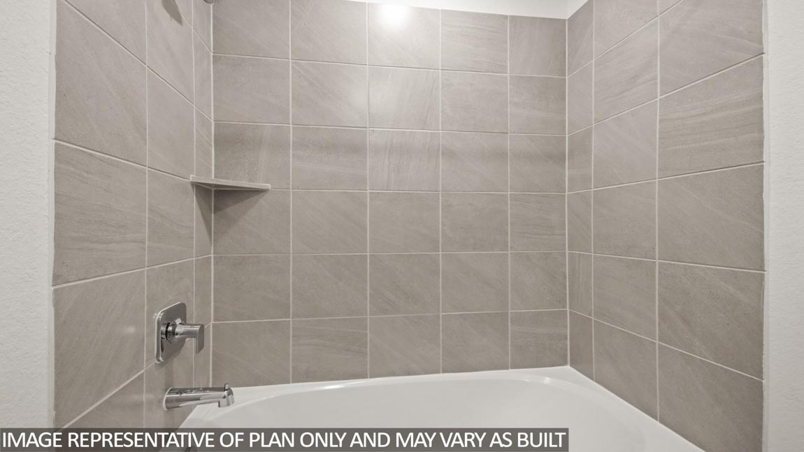 Primary bathroom with shower and linen storage