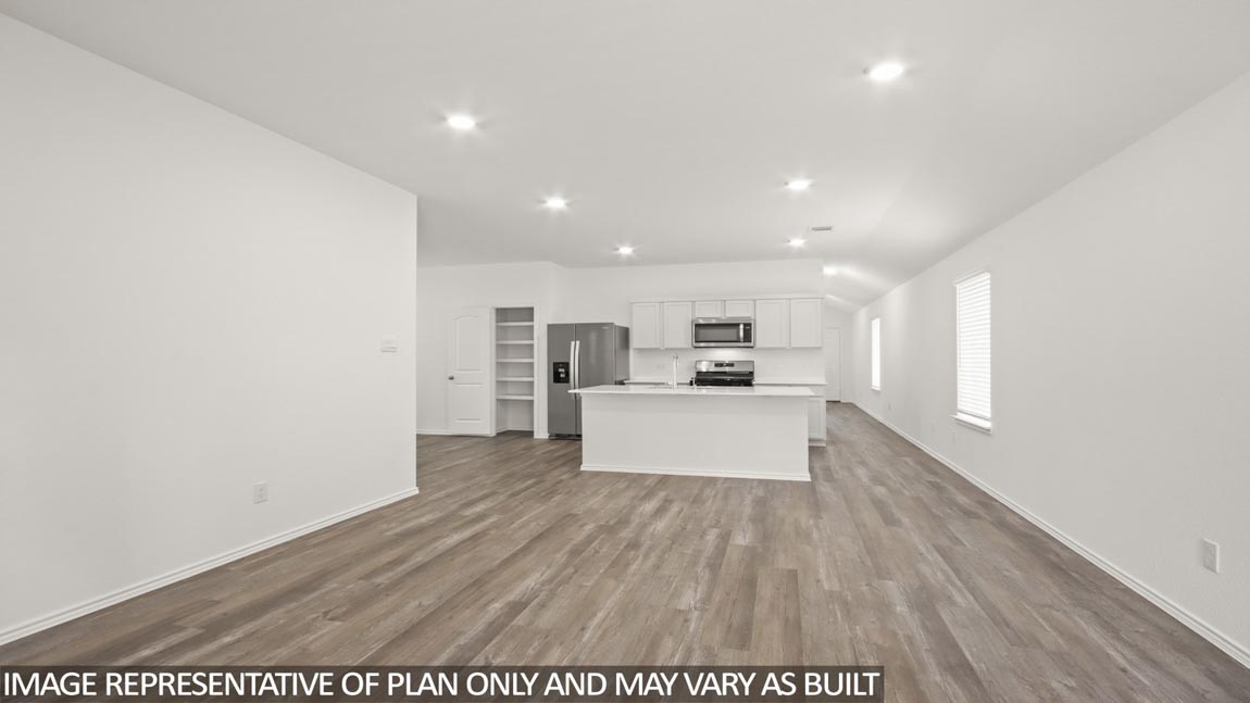 Open concept living, dining, and kitchen area