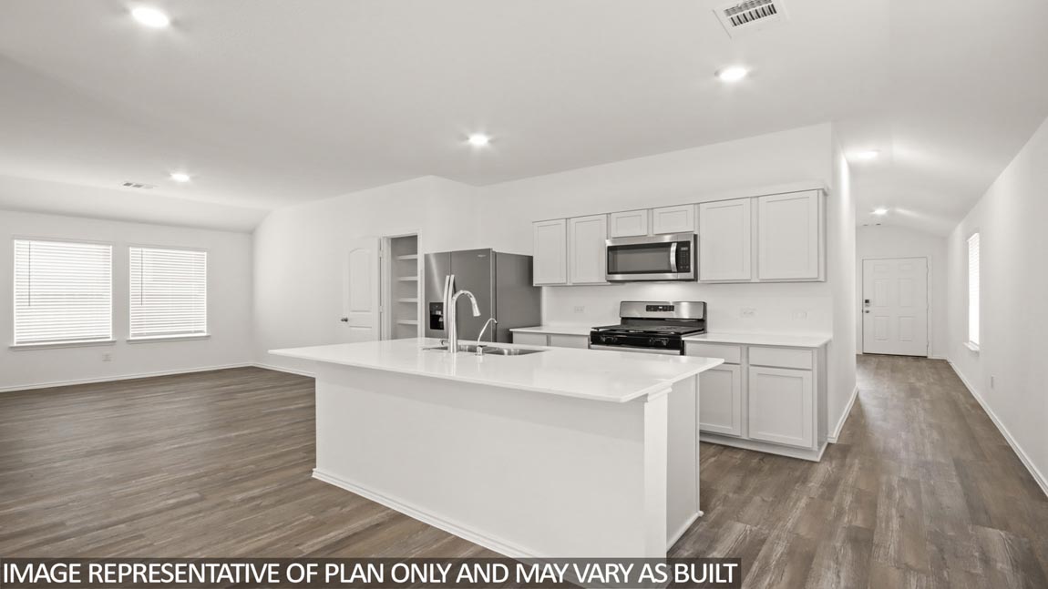 Open concept living, dining, and kitchen area