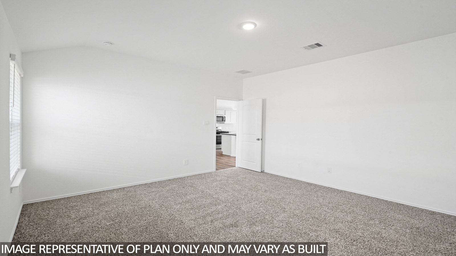 primary bedroom with bright windows