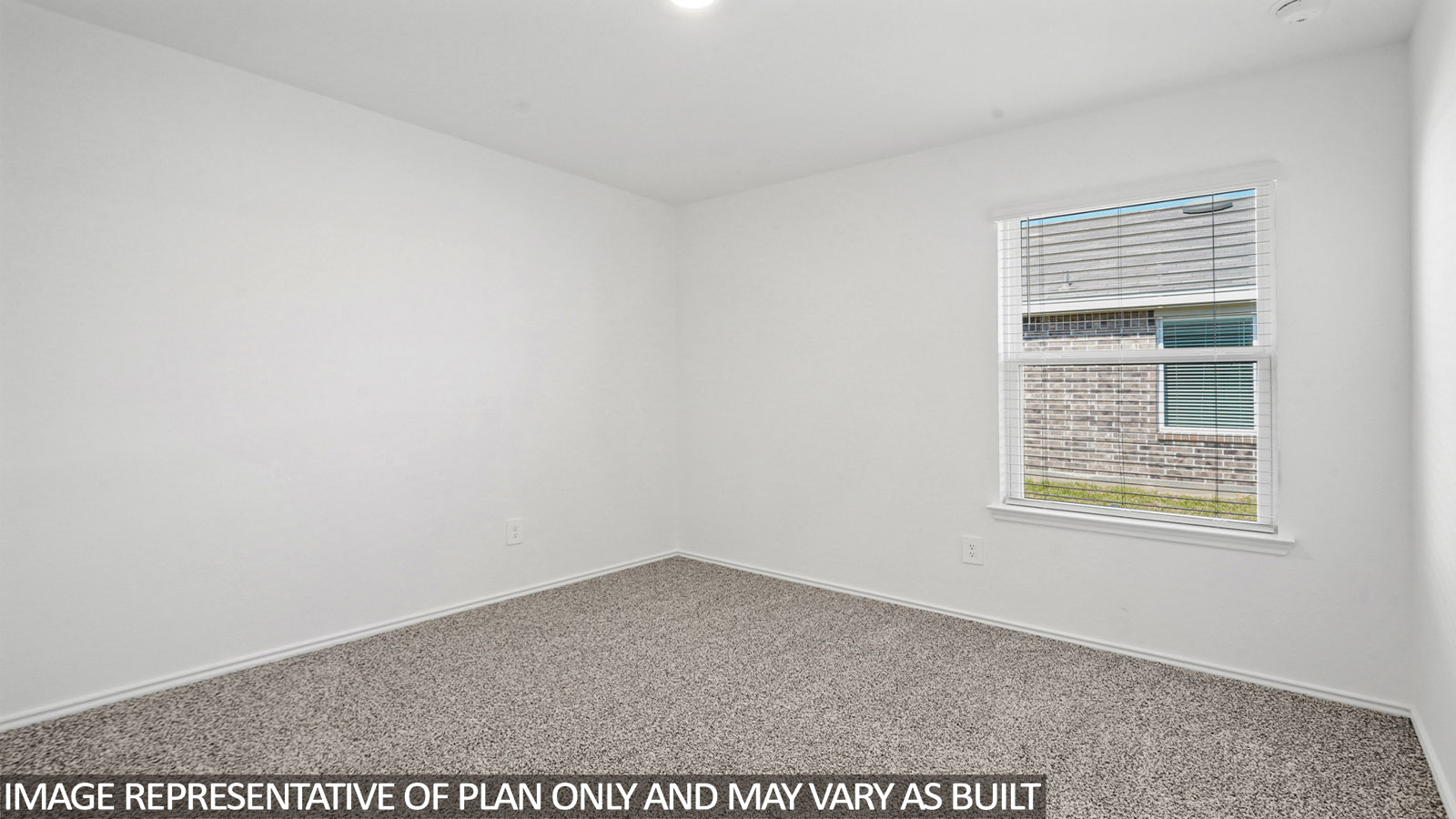 secondary bedroom with carpet flooring