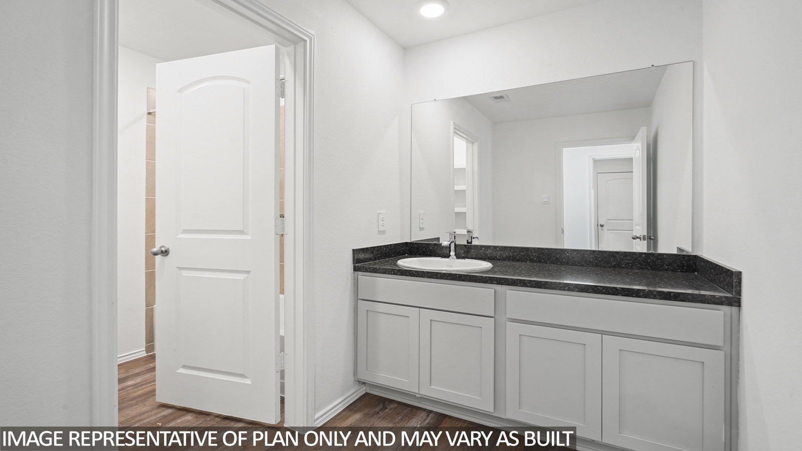 secondary bathroom with vinyl flooring