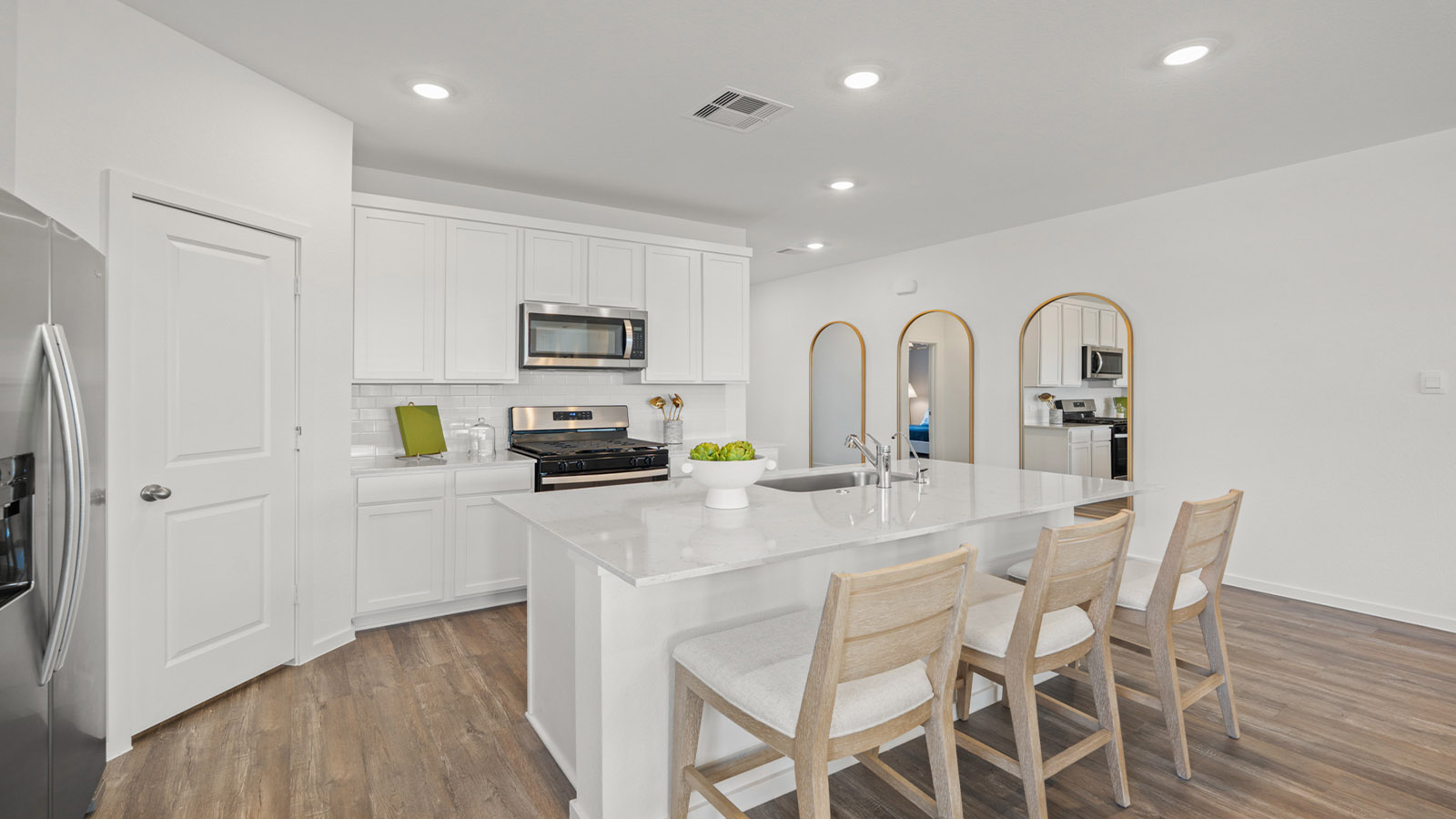 Open concept living, dining, and kitchen area
