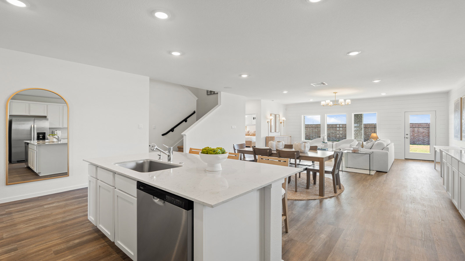 Open concept living, dining, and kitchen area