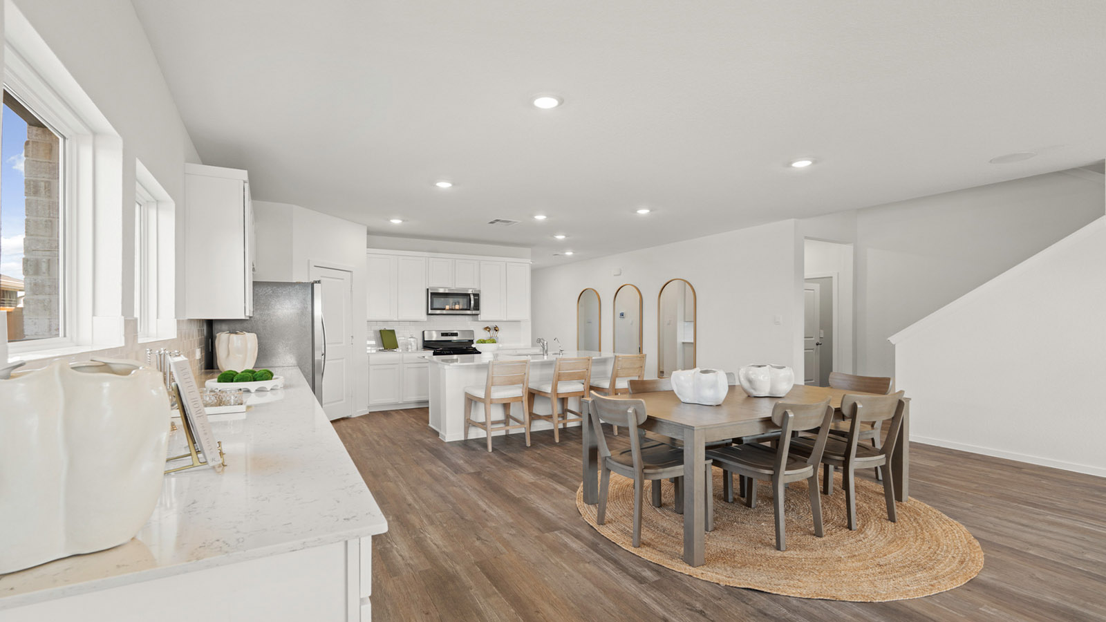 Open concept living, dining, and kitchen area