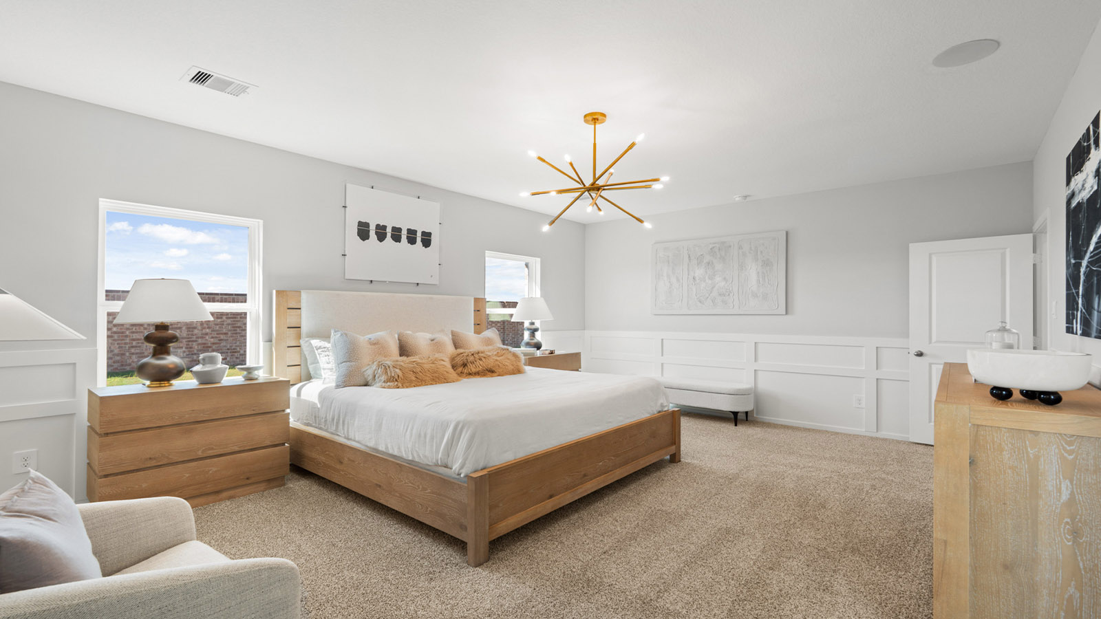 Primary bedroom with carpet flooring