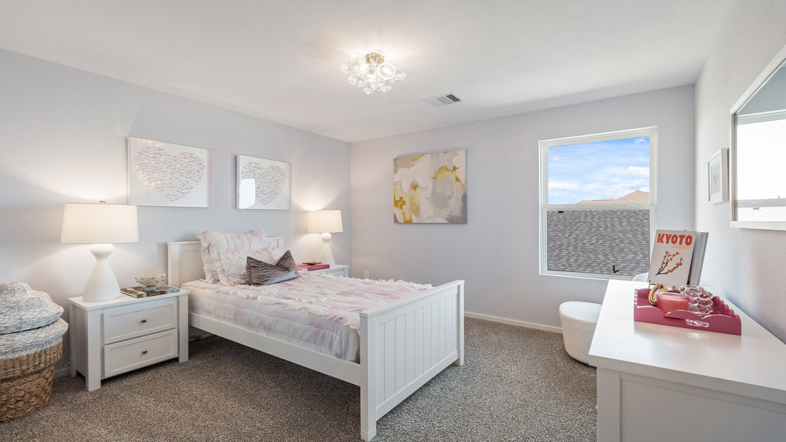 Secondary bedroom with carpet flooring