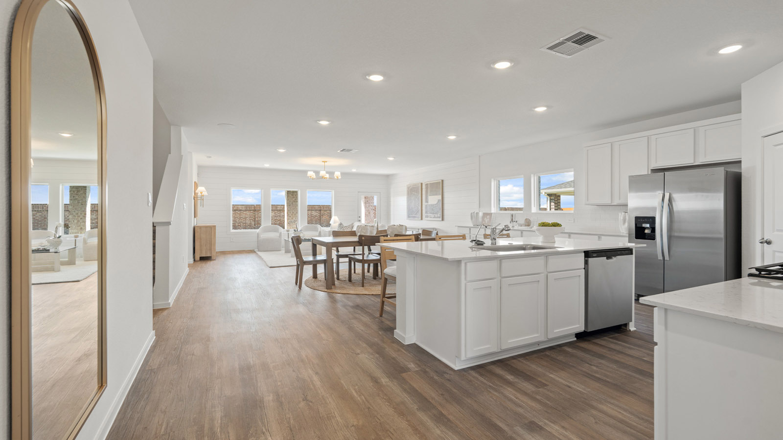 Open concept living, dining, and kitchen area