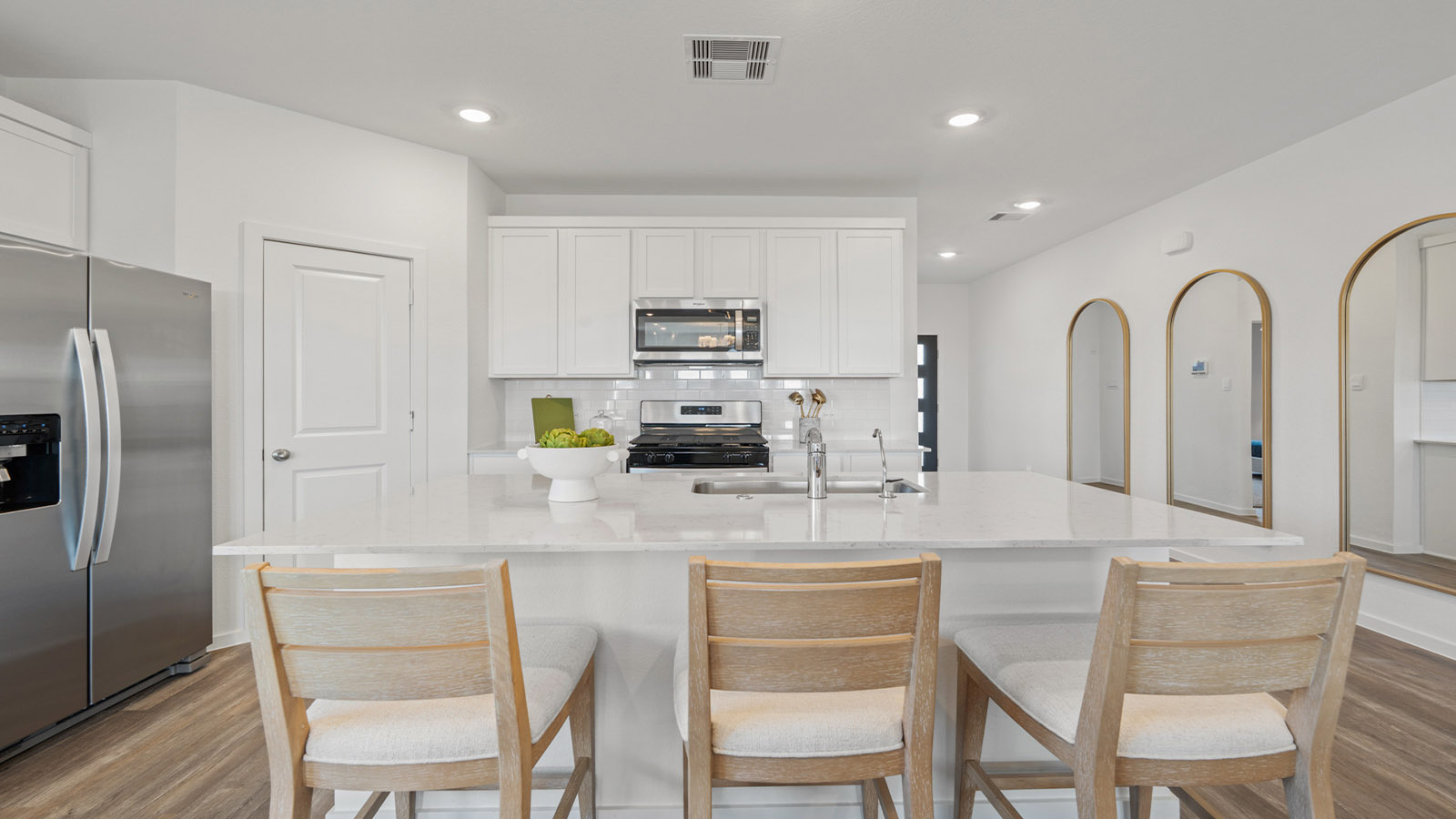 Open concept living, dining, and kitchen area