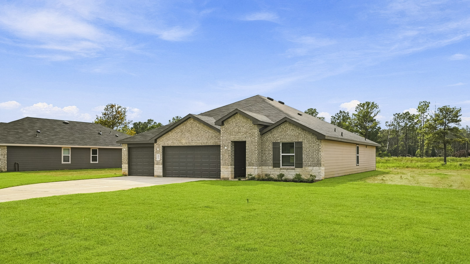 One story home with three car garage