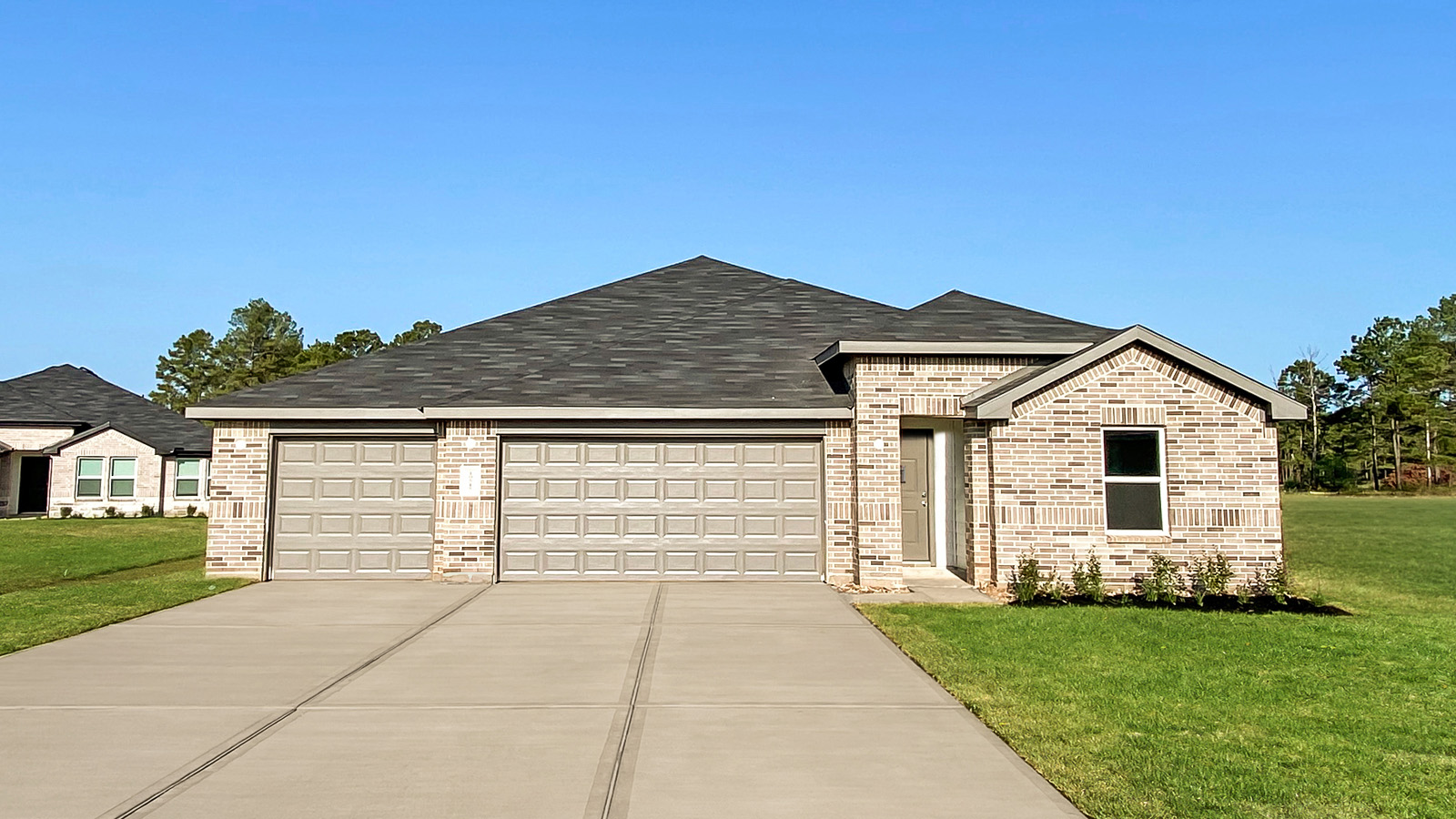 One story home with three car garage