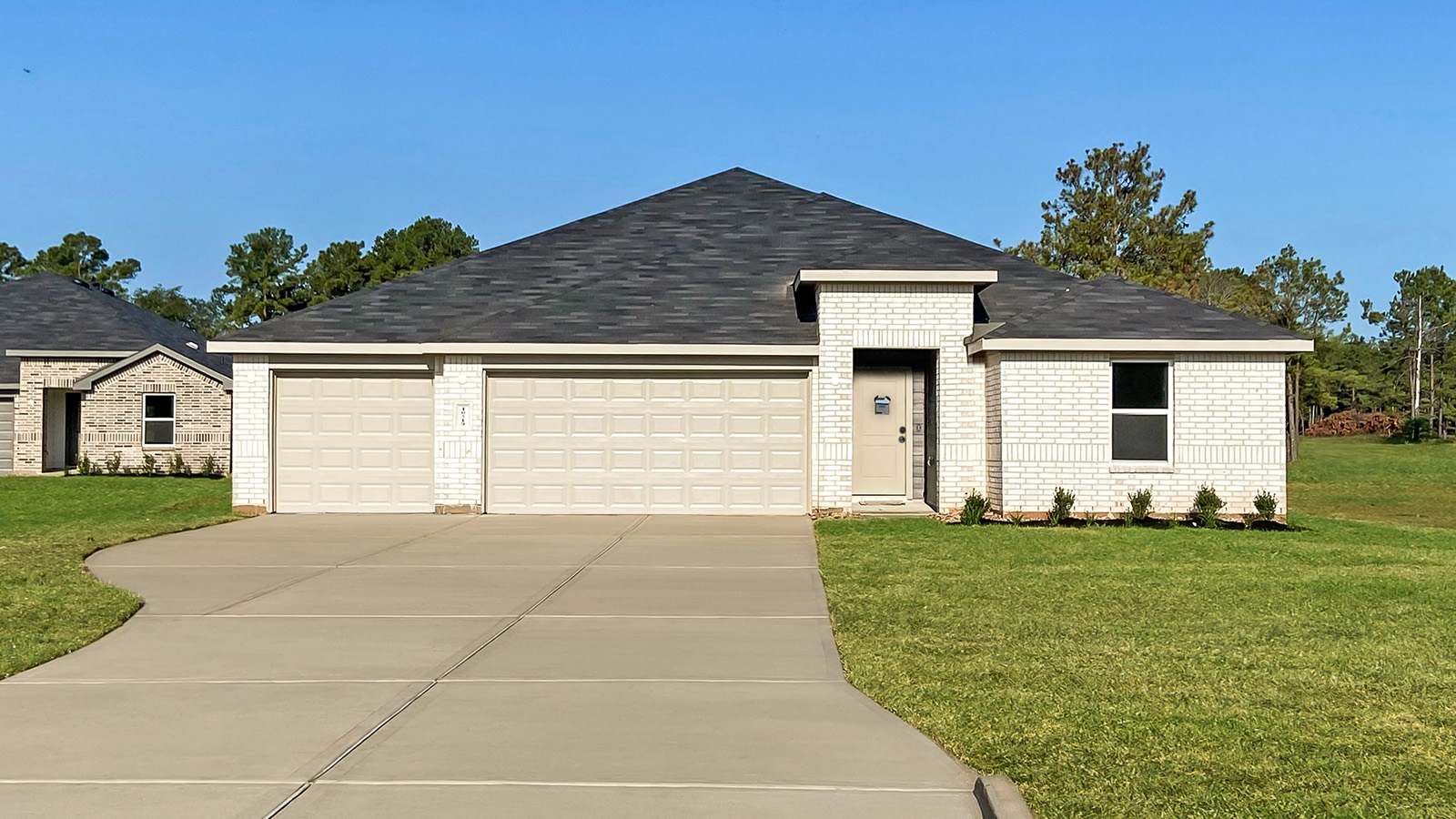 One story home with three car garage