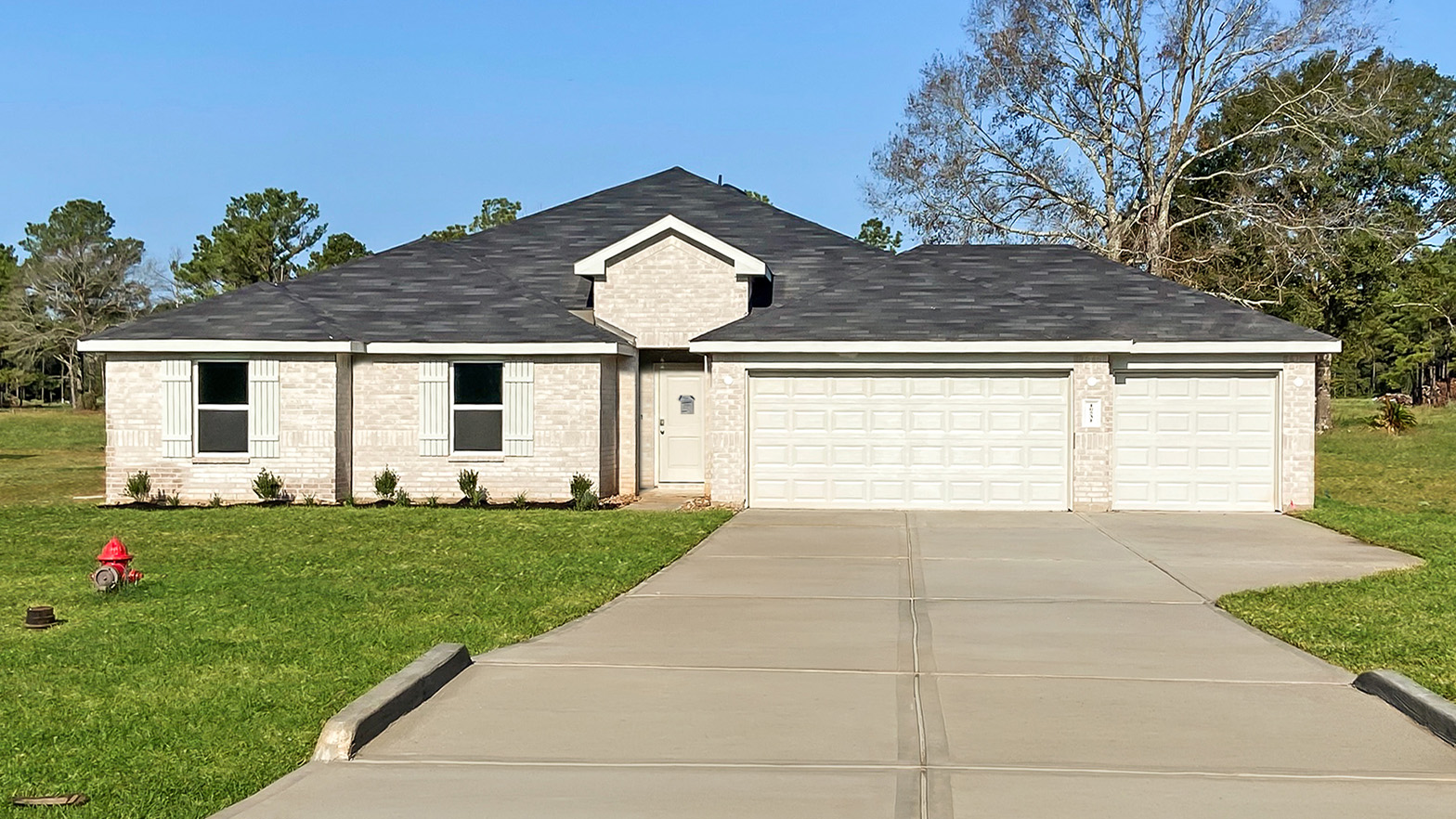 One story home with three car garage