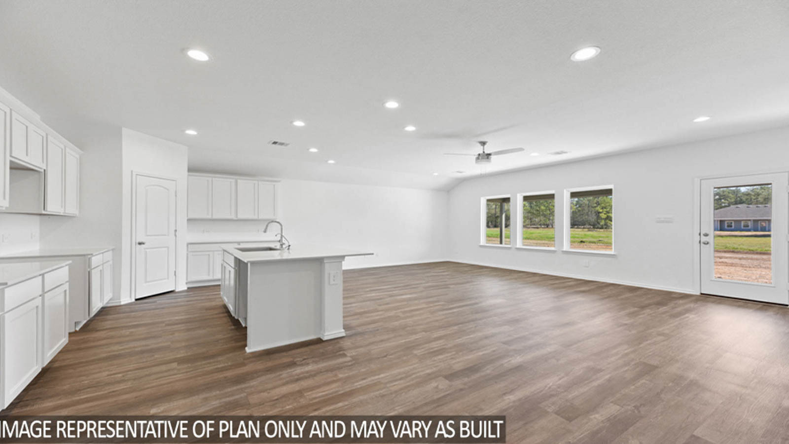 Open concept living, dining, and kitchen area