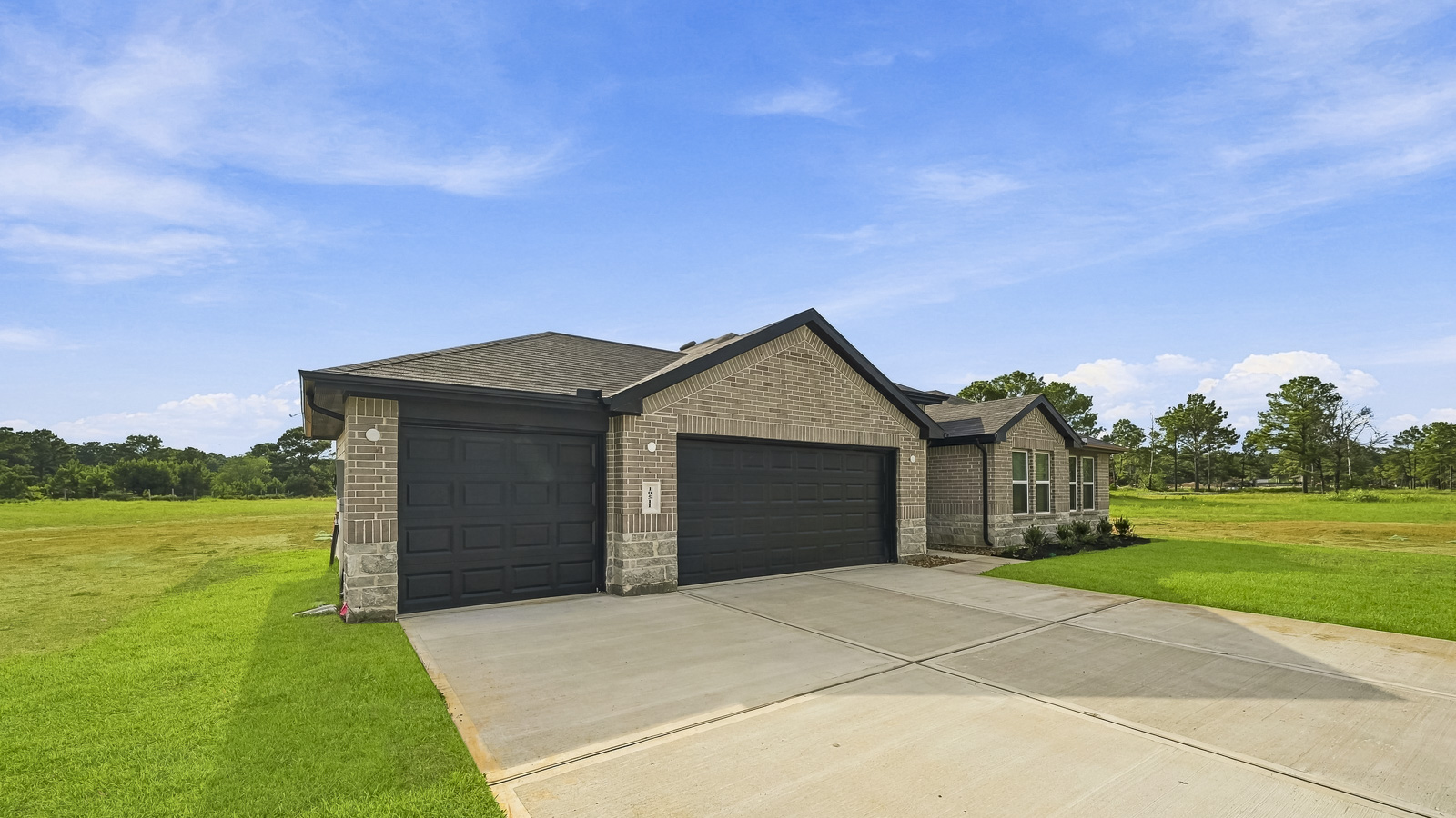 One story home with three car garage