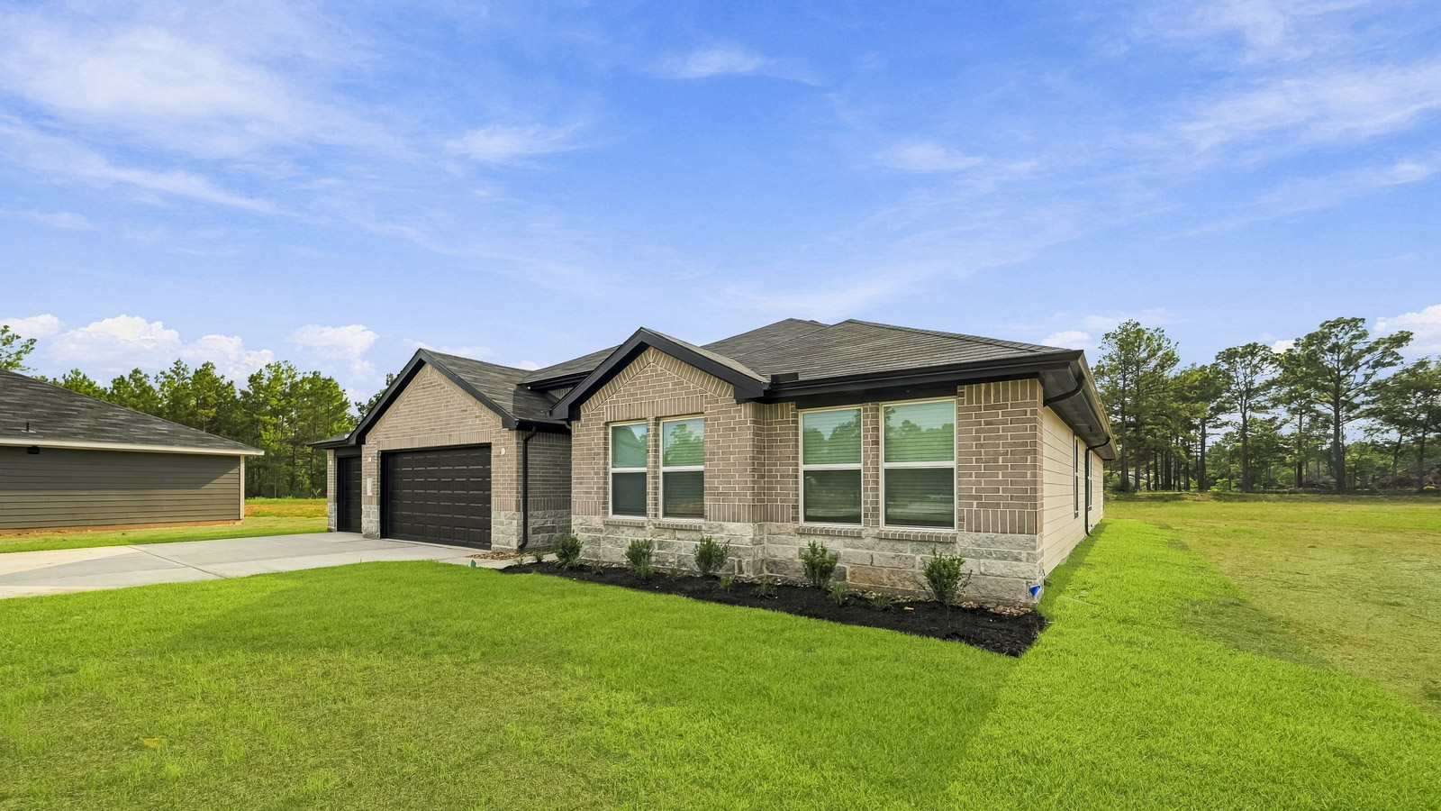 One story home with three car garage